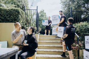 Moving house tips – professional removalists loading a truck in Australia